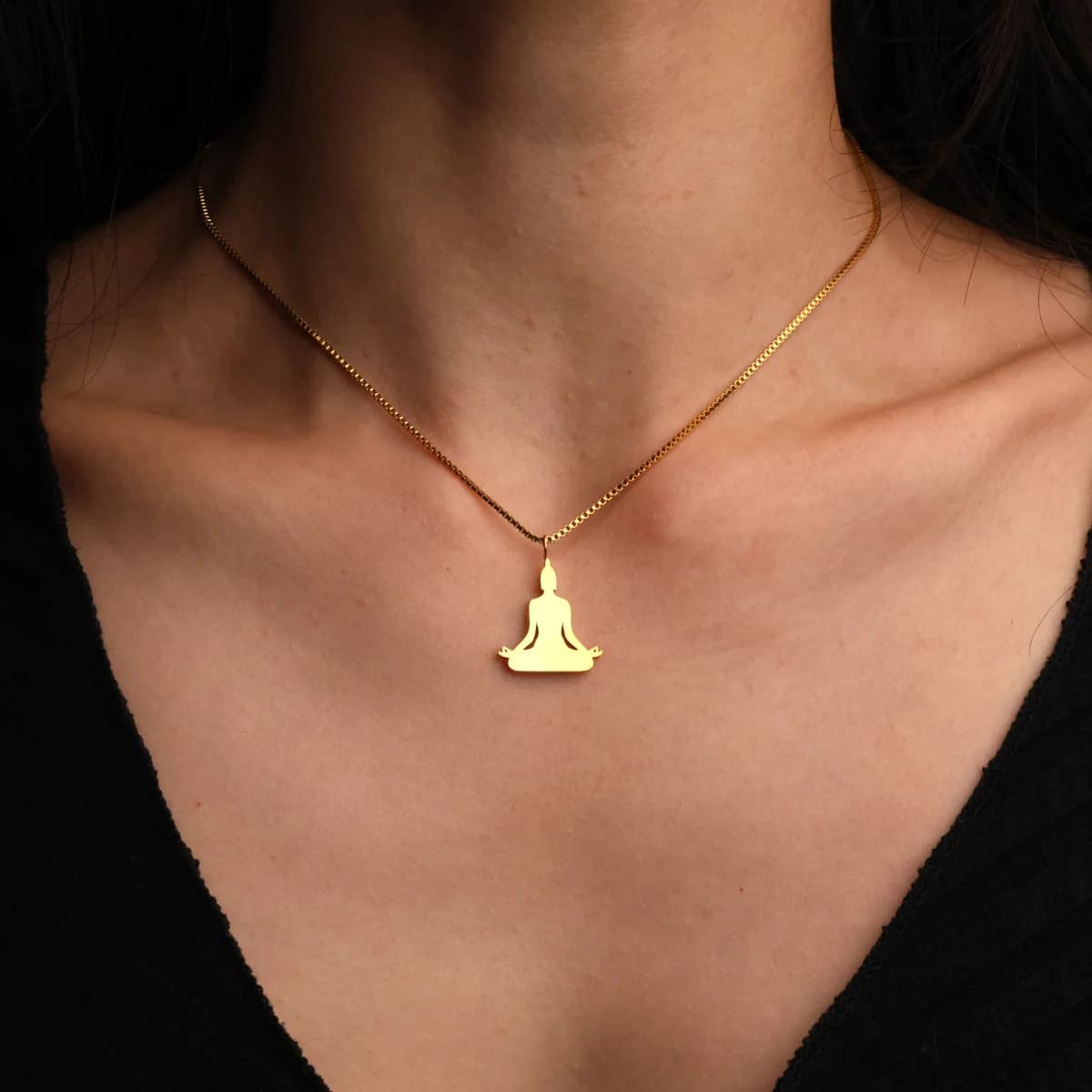 Buddha pendant worn